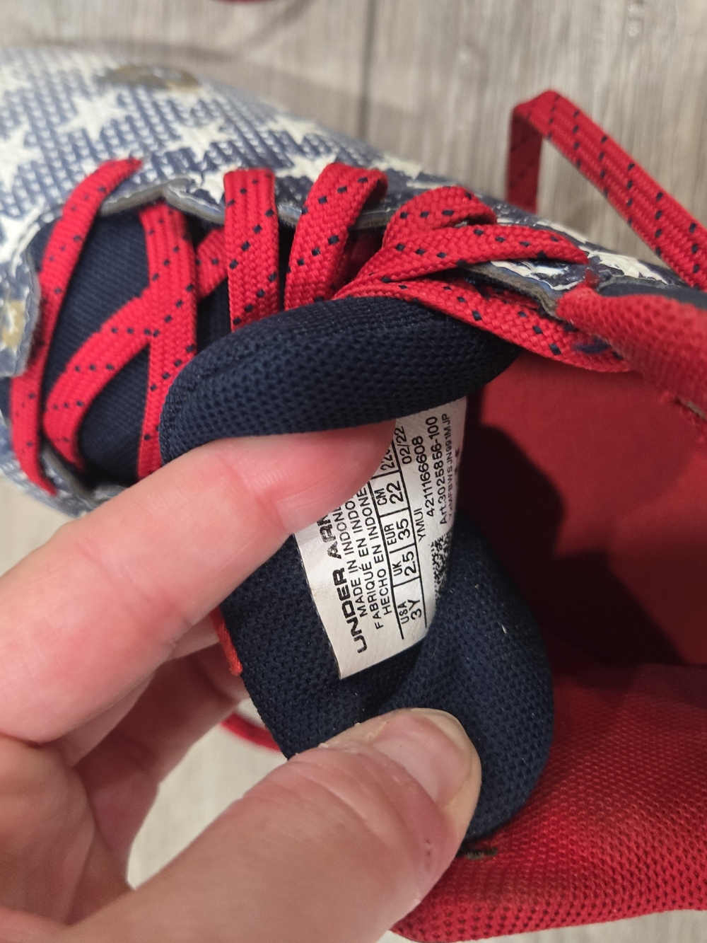 Under Armour Kids' Navy and Red Star Football Cleats
